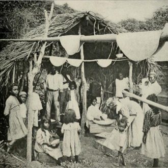 Residents of Saint Vincent making casabe (cassava bread) in the 1910s