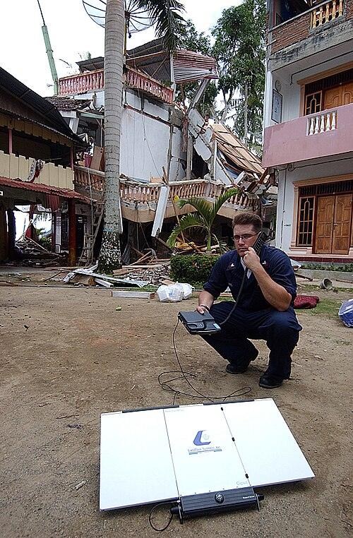 2005 Nias–Simeulue earthquake: U.S. Navy communicates with Military Sealift Command hospital ship USNS Mercy (T-AH-19) using Inmarsat satellite telephone in Nias (April 2005).