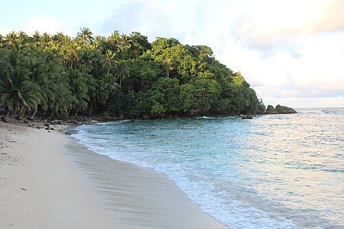The beach at the Magpupungko Rock Pools at high tide in Pilar