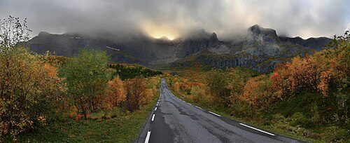 A mountain massif of Flakstadøya island backgrounding the road to Nusfjord village