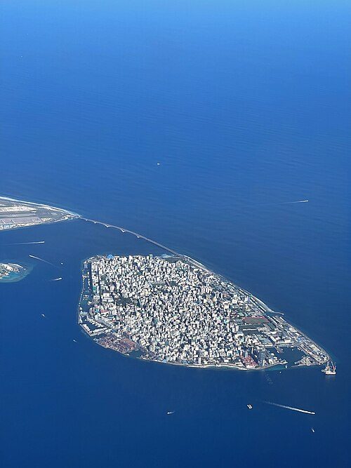 Malé in 2022, with a bridge to the airport and Hulhumalé