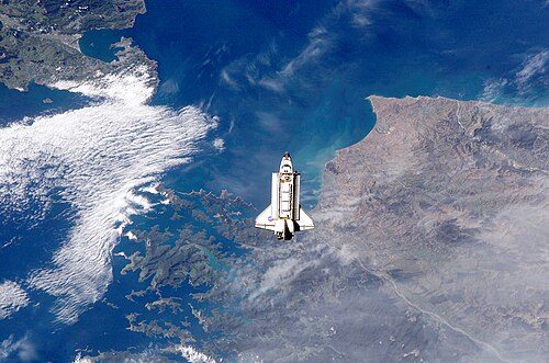 The Sounds visible to the left of the Space Shuttle, image taken from the International Space Station